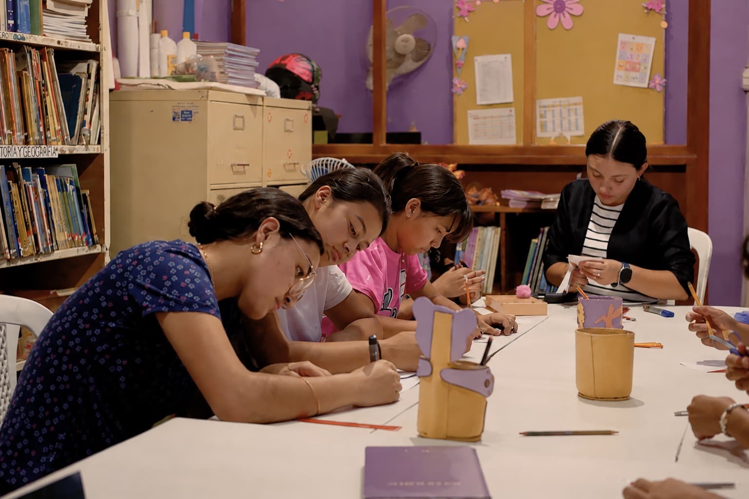 Students writing letters at the center in Jinotega